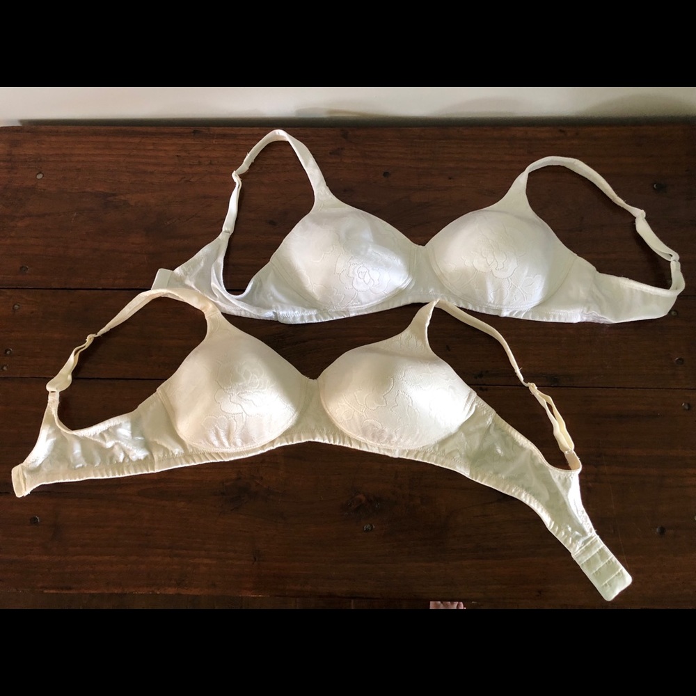 Two Vanity Fair white & cream bras